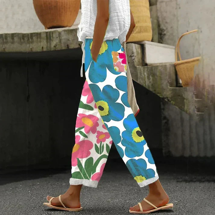 Stylish women's floral print pants with a vibrant design. Versatile bottoms for comfortable fashion & spring/summer wear.
