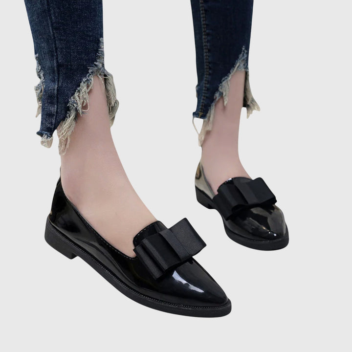 Cushioned orthopaedic loafers for women, offering all-day support in a classic, versatile style.