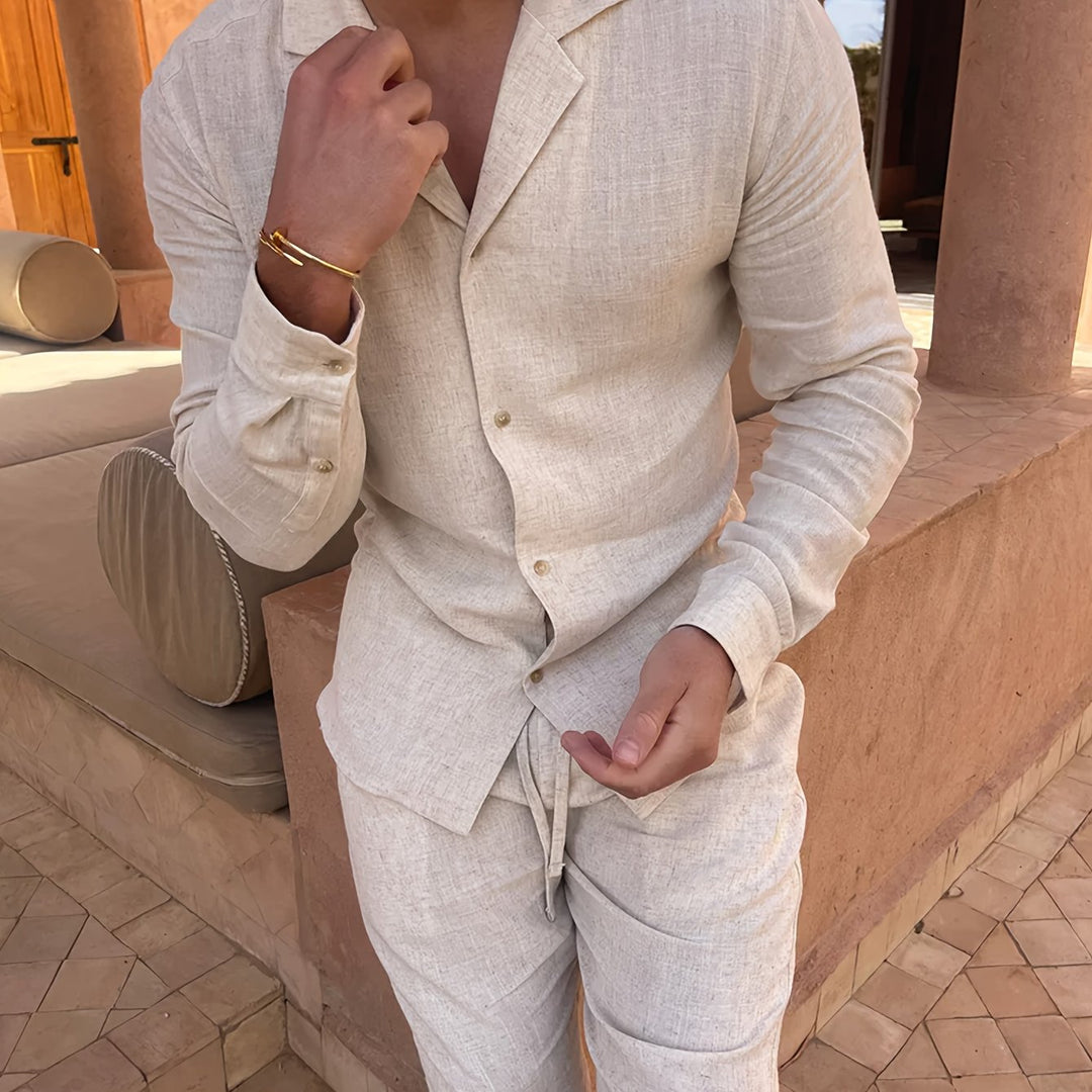 Detail of collar and buttons on a black men's minimalist linen blend two-piece set, semi-formal ready.