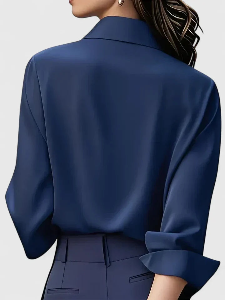 Timeless women's elegant button-down blouse. Long sleeve classic shirt, perfect for both office and casual wear.