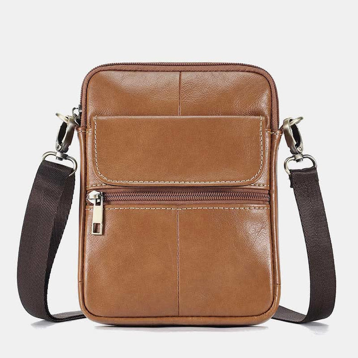 Men's small everyday shoulder bag. Compact crossbody essential for daily items and convenient travel.