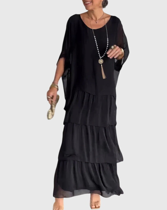Elegant women's long maxi dress with a beautiful flowing design, very versatile & chic.