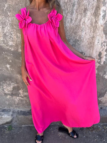 Elegant women's flowing maxi dress with bow straps, ideal for summer parties, vacations, or special events.