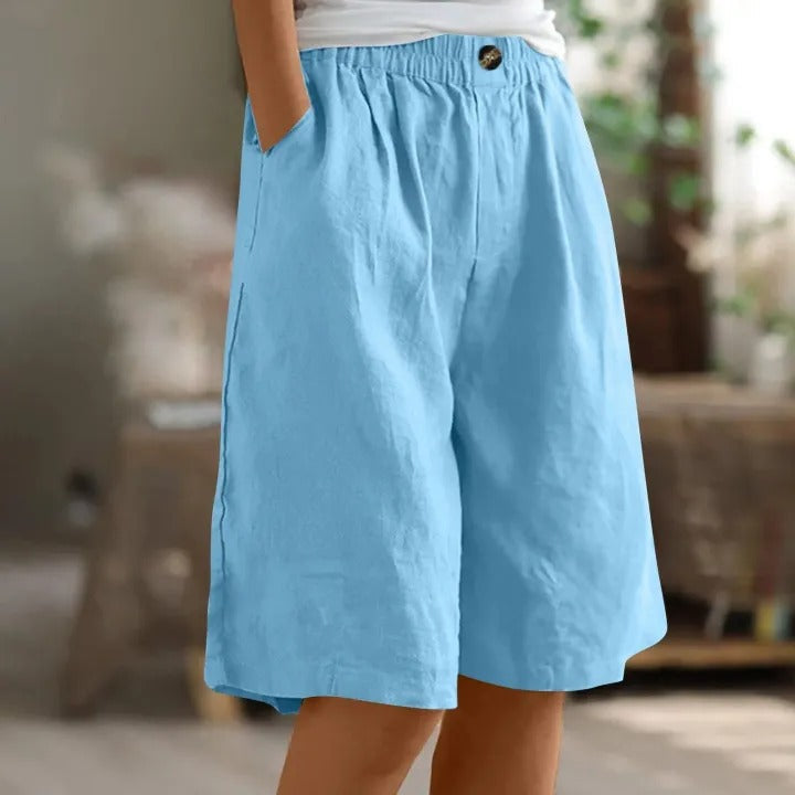 Women's relaxed fit summer shorts with elastic waist, perfect for casual comfort & warm weather activities.