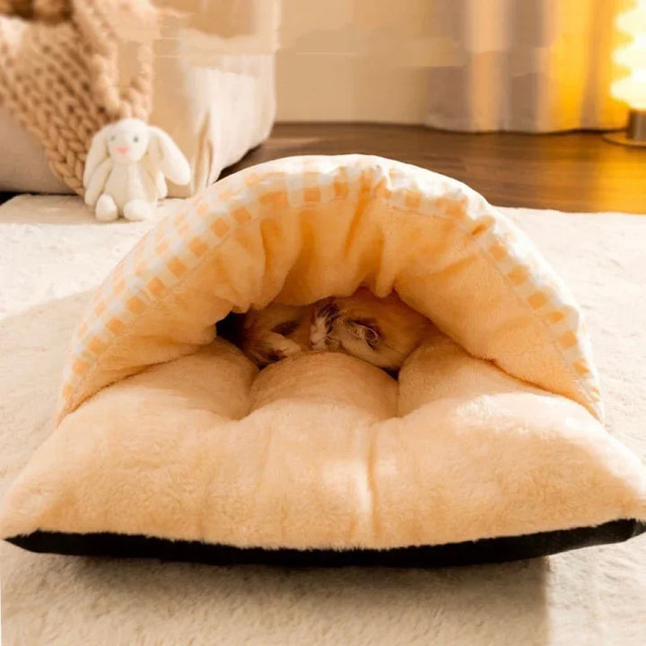 Feline plush snuggle sleeping bag bed. Cozy cat cave for warm, secure naps & comfort.