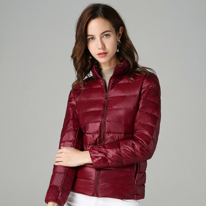 Comfortable women's ultralight waterproof jacket, perfect for stylish everyday casual wear & light outdoor protection.