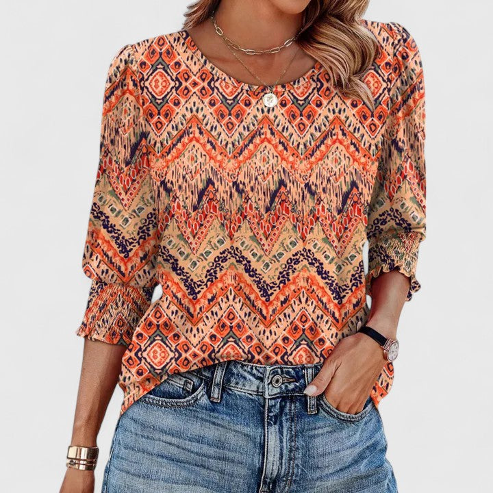 Ladies' elegant smocked top for women, chic spring apparel, effortless casual summer fashion blouse.