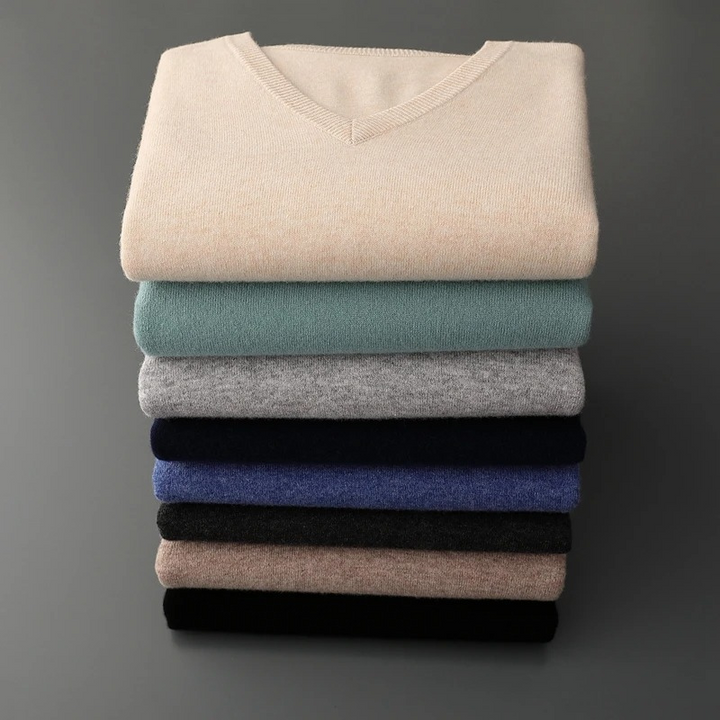 Men's soft V-neck knit sweater in classic style. Perfect for all-season comfort & versatile layering.