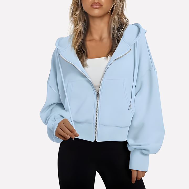 Street style women's cropped zip hoodie, featuring a modern relaxed design.