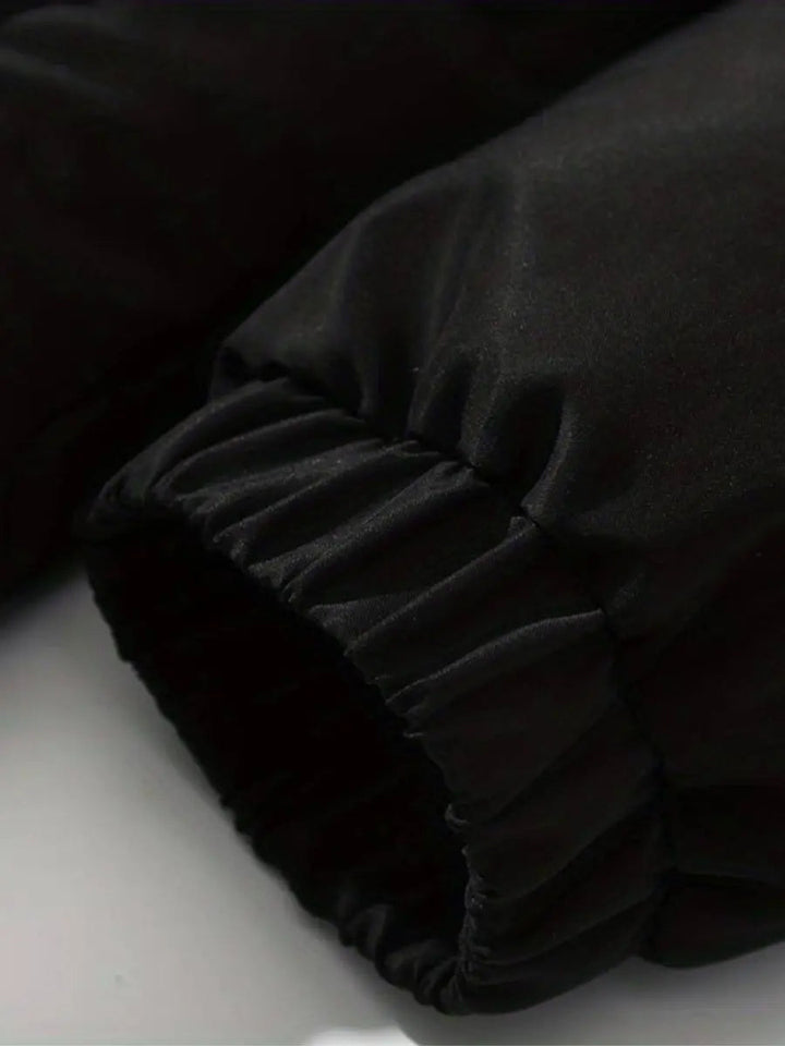 Elegant navy blue puffer jacket for women, featuring a luxurious plush hood & warm insulation.