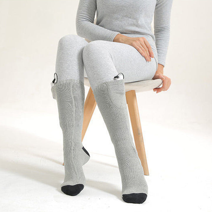 Unisex HeatWave rechargeable heated socks. Warm winter socks for hiking, skiing, and cold weather.