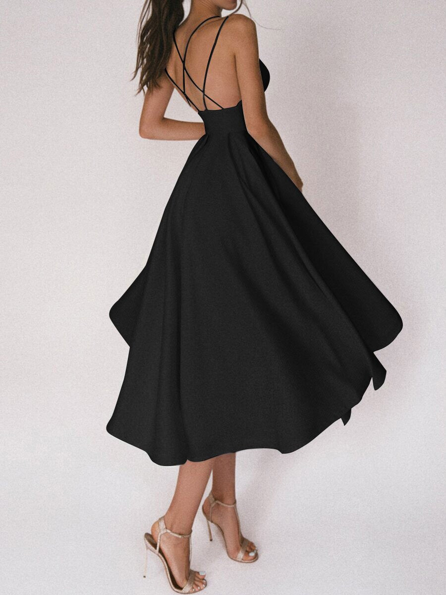 Elegant women's summer midi dress, featuring a flattering V-neckline and delicate spaghetti straps.