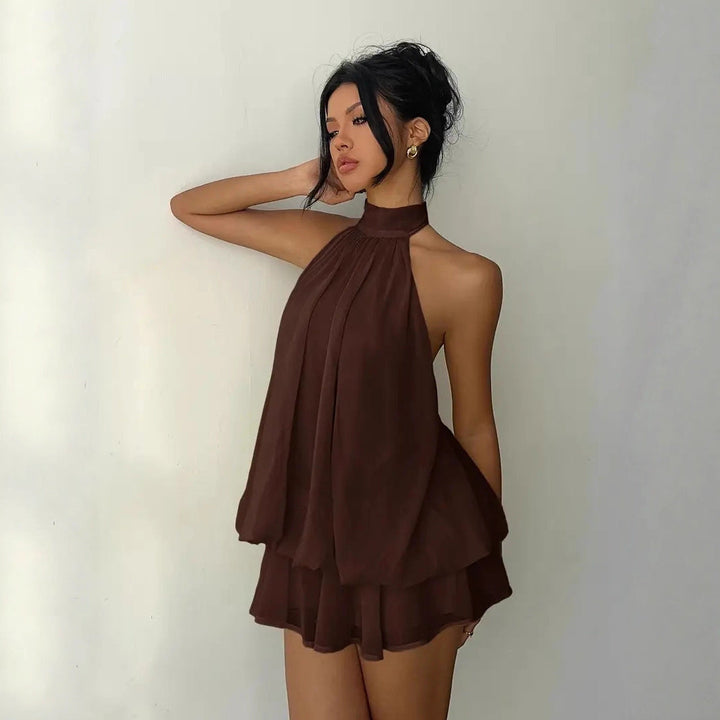 Flattering women's tiered ruffle mini dress with a fashionable halter neck for a playful look.
