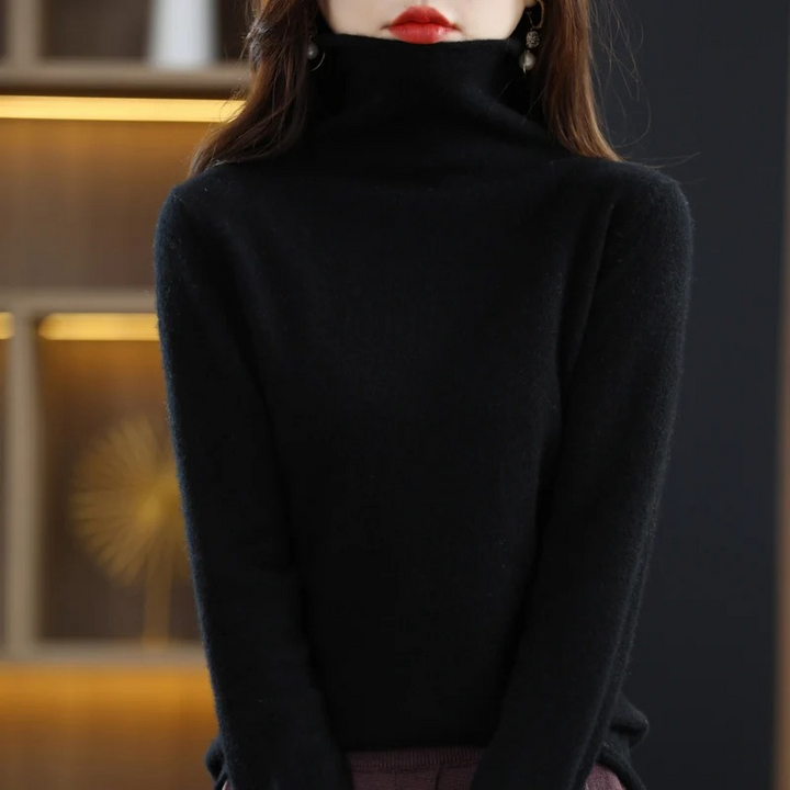 Elegant women's soft sweater. Roll neck, long sleeve pullover for autumn/winter style.