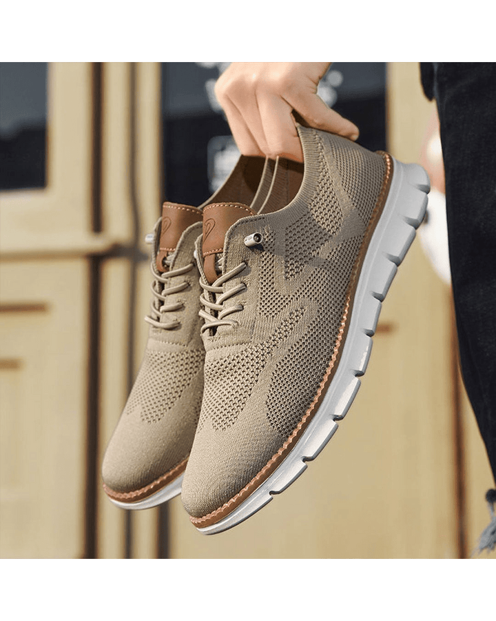 Men's everyday trainers with secure lacing, offering comfort & modern style.