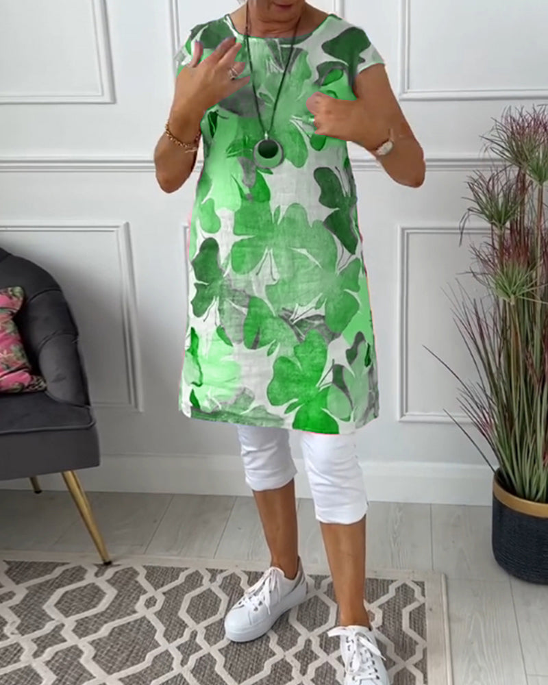 Women's relaxed fit floral dress, elegant casual design, perfect for summer everyday wear.