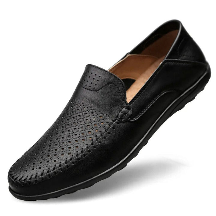 Men's perforated slip-on loafers with stitched panel, ideal for comfortable casual summer and spring wear.