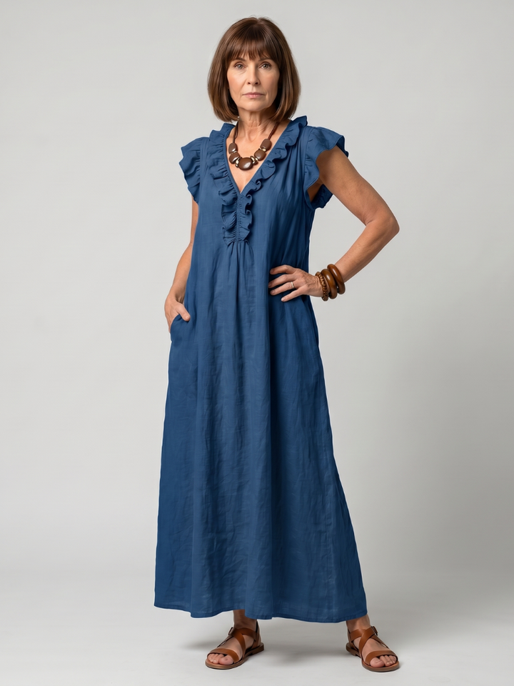 Front view of women's sleeveless ruffle trim midi dress, showing V-neck and flowing silhouette.