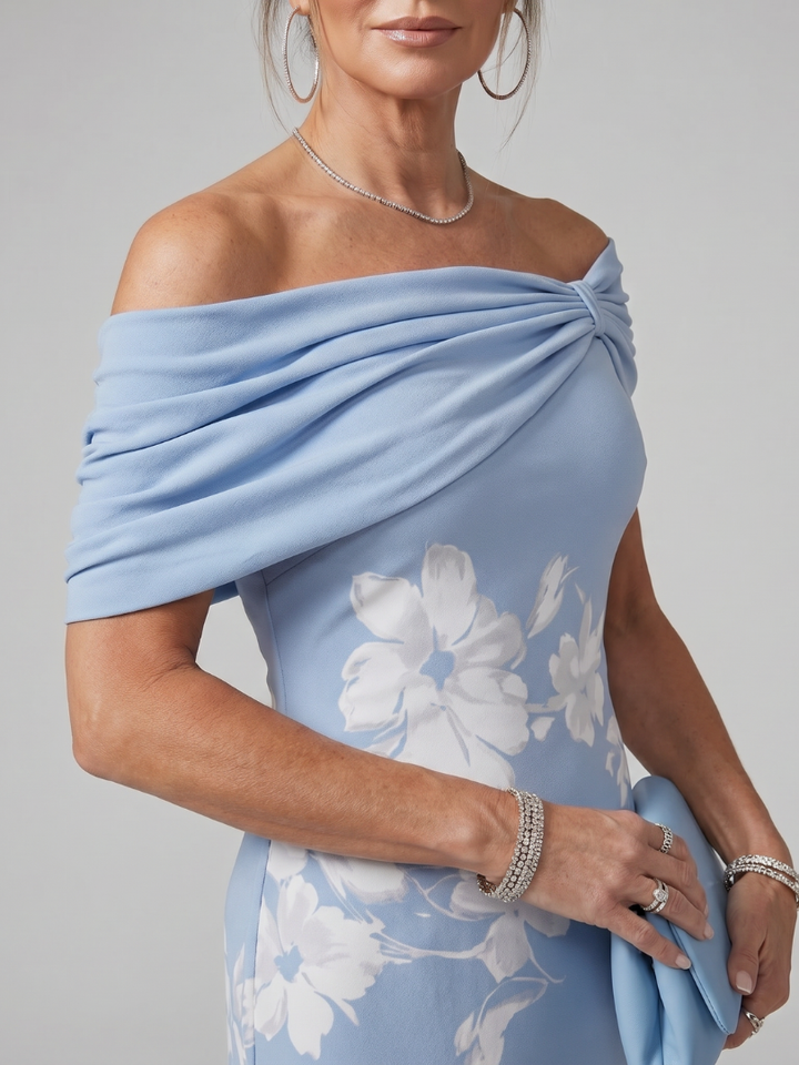 Elegant women's green off-shoulder midi dress, featuring a beautifully draped neckline, perfect for sophisticated wear.