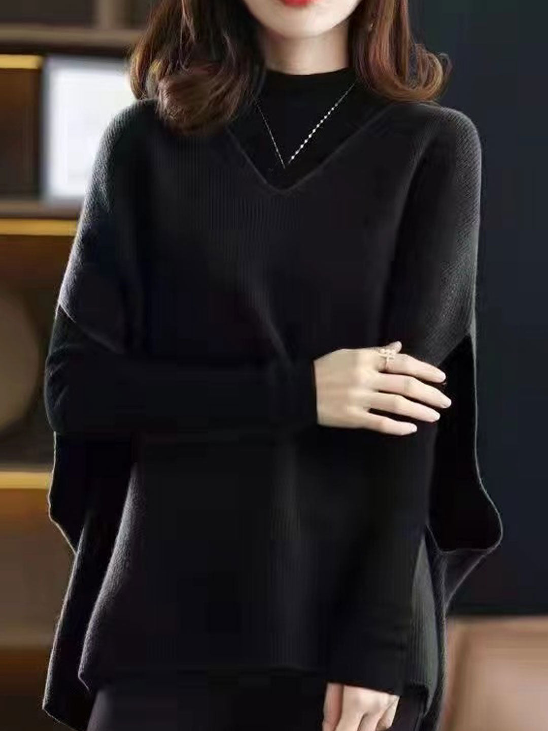 Stylish V-neck knit vest for women, a sleeveless solid color top ideal for versatile layering.