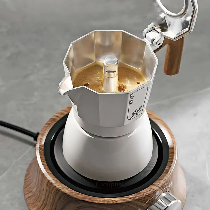 Compact coffee heater, a small appliance keeping your hot beverages warm at work or home.