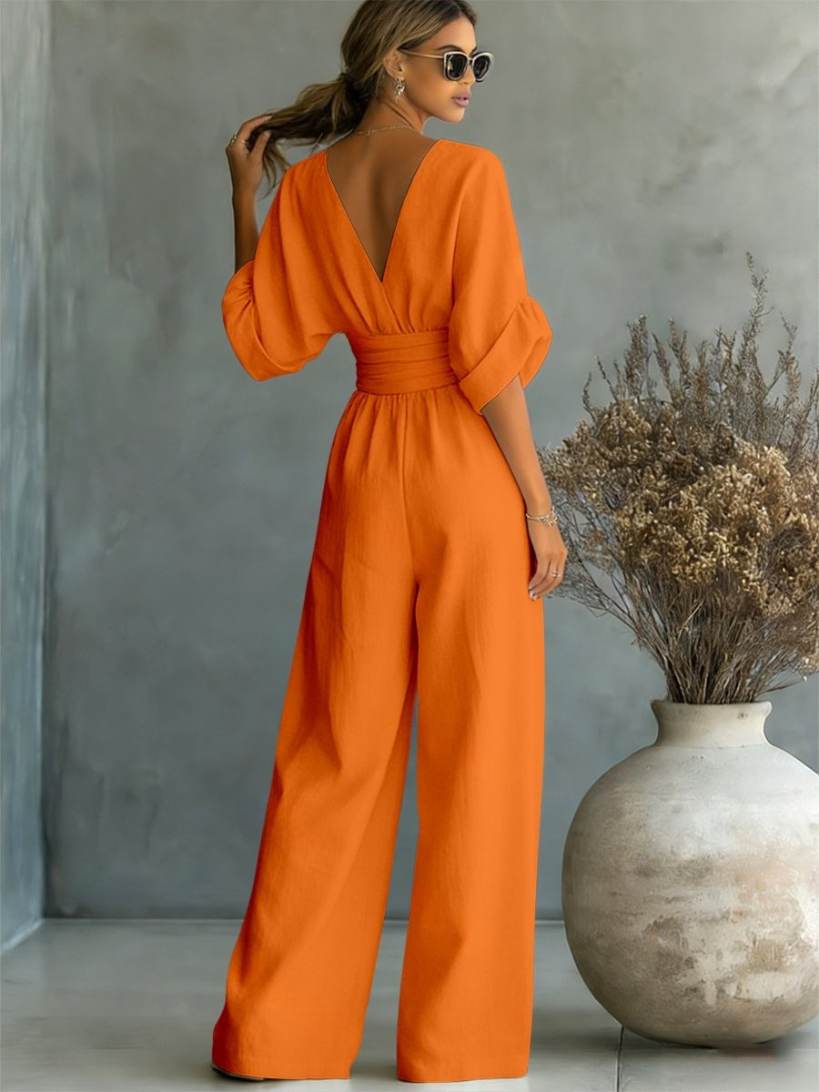 Women's elegant V-neck jumpsuit, a chic and tailored one-piece perfect for work & weekend.