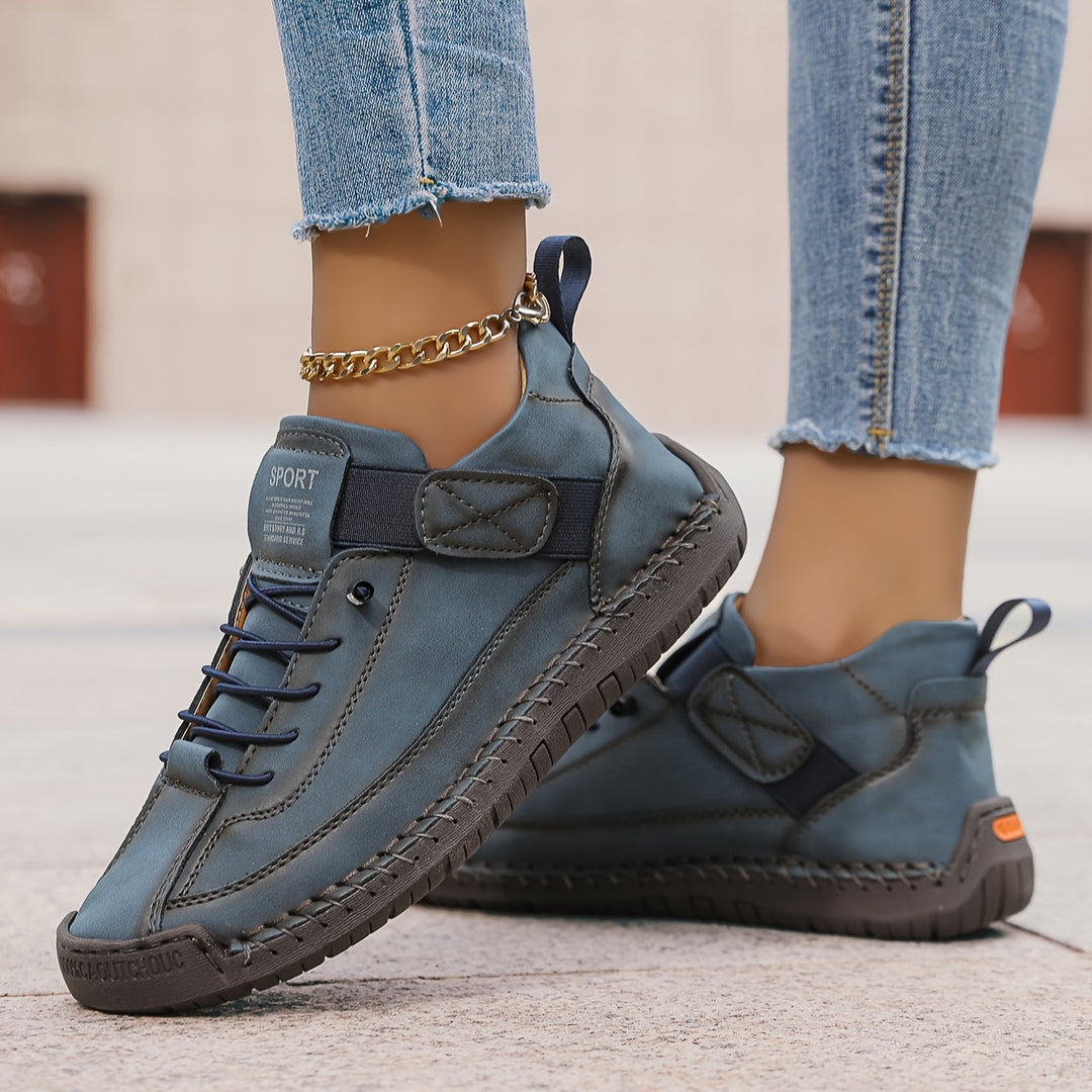 Pair of women's orthopaedic comfort trainers, ready for daily support, casual wear & pain-free walking.