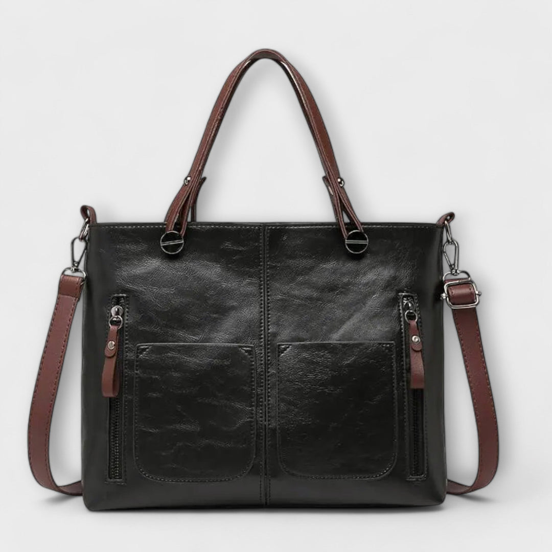 Elegant women's leather shoulder bag, classic black design. Perfect as a versatile daily handbag.