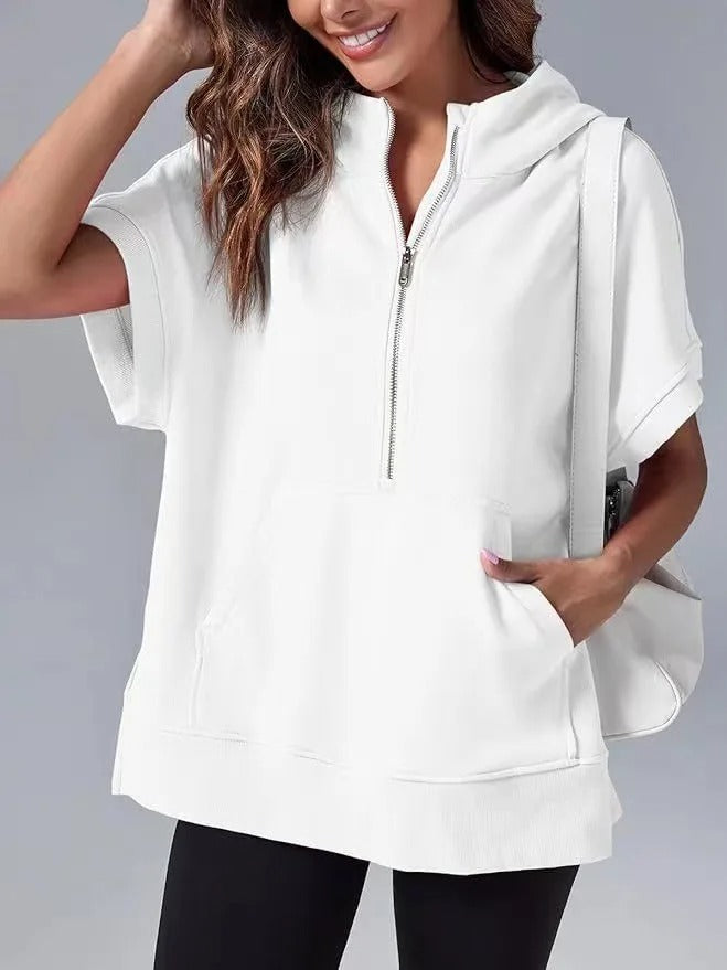 Relaxed fit women's short sleeve hooded top, half-zip detail, ideal for casual fashion.