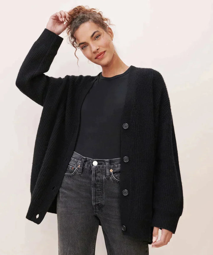 Chic women's knit cardigan, perfect for versatile fall style, offering timeless elegance and comfort.