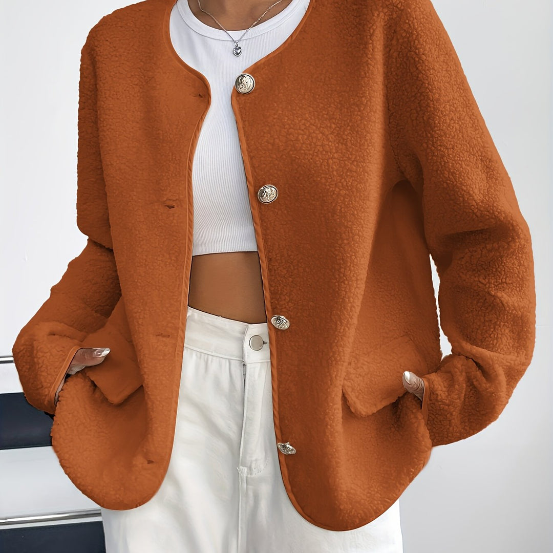 An elegant women's button-front jacket; soft, long-sleeve, timeless autumn & winter outerwear essential.