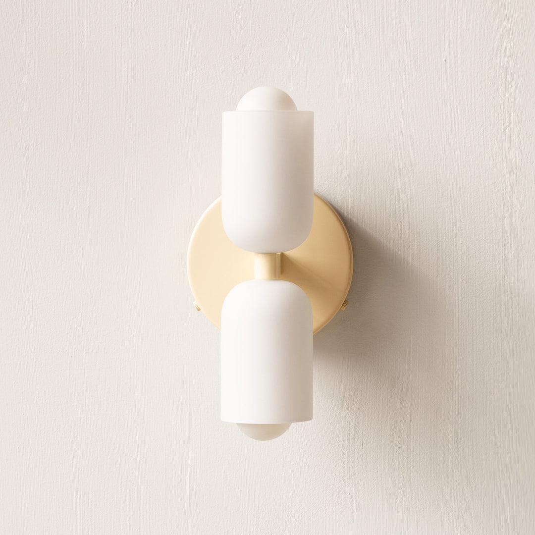 Contemporary wall decor lamp, uplight downlight, for sophisticated ambient home lighting.