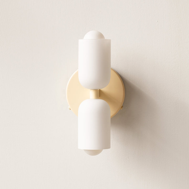 Contemporary wall decor lamp, uplight downlight, for sophisticated ambient home lighting.