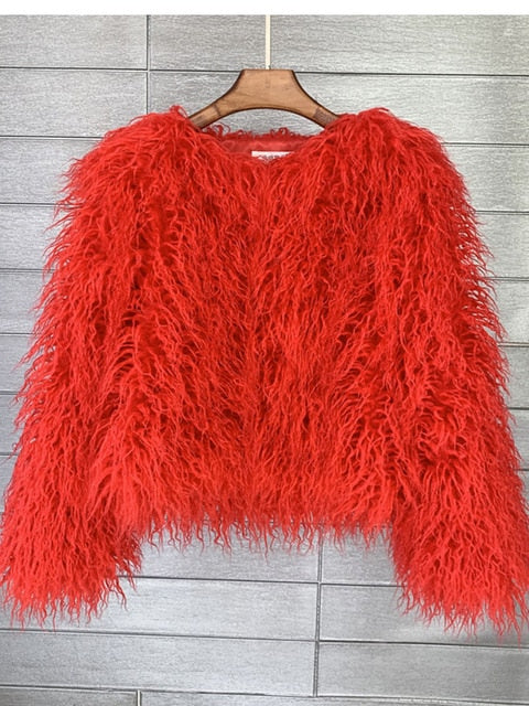 Cozy and warm women's elegant winter coat. Stylish long-sleeve outerwear, perfect for cold weather fashion.