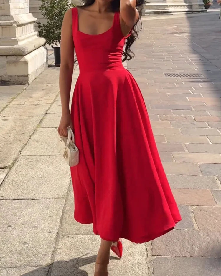 Form-fitting women's red midi dress with elegant thin straps, a perfect summer dress or evening outfit.