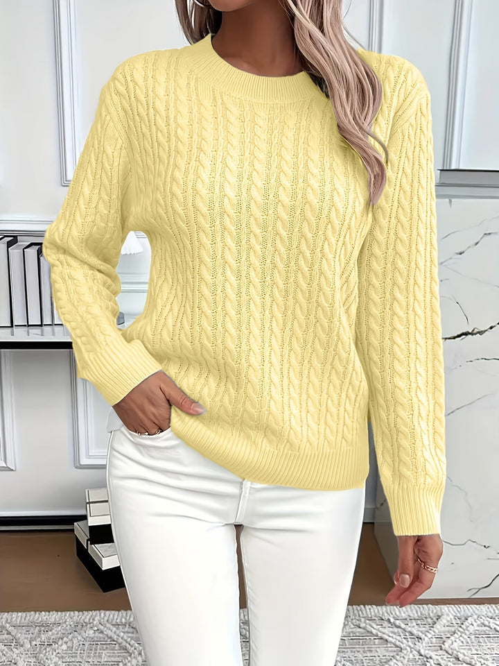 Versatile women's cable knit jumper. Cozy sweater, perfect for layering & timeless winter fashion.
