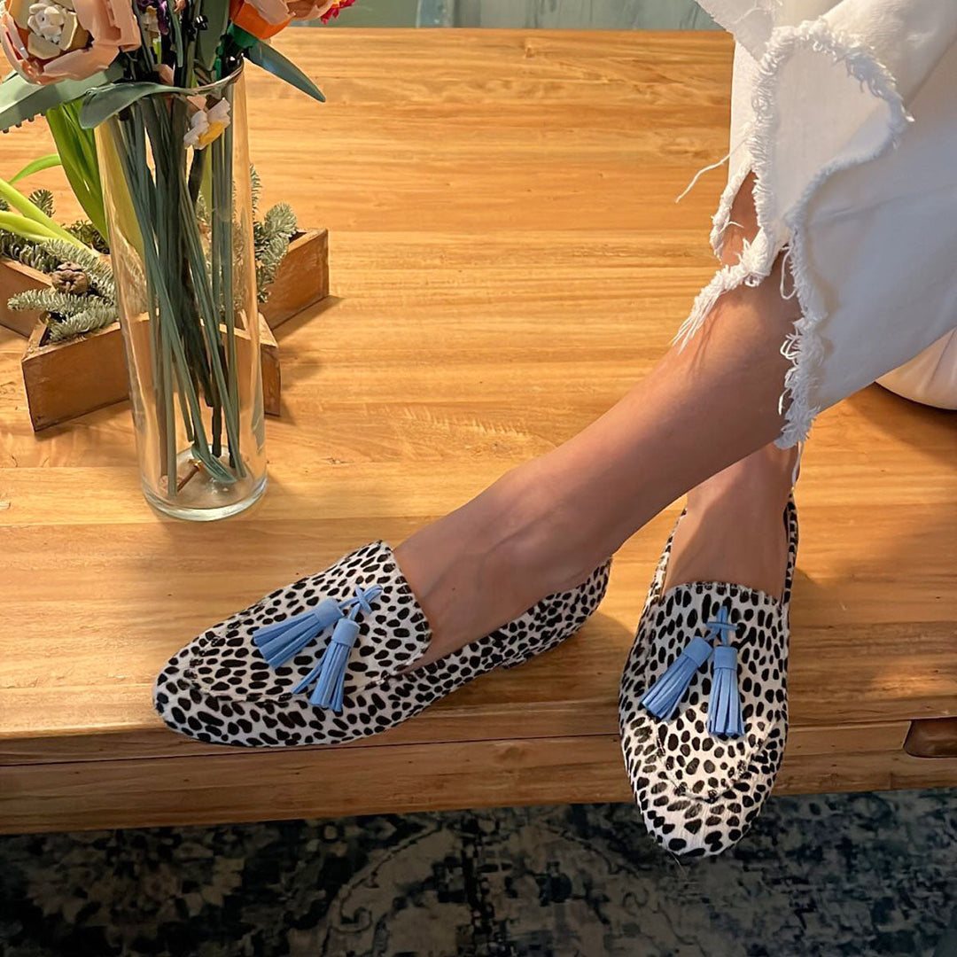 Stylish women's fringe moccasins in a unique pattern, perfect for casual chic everyday comfort. Slip-on flat shoes.
