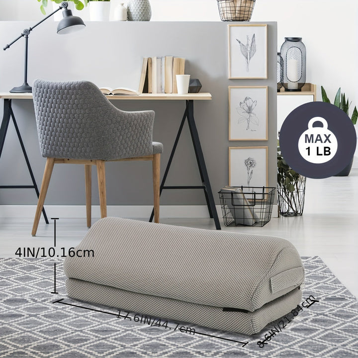 Soft memory foam footrest cushion, enhancing comfort and support for improved posture at work.