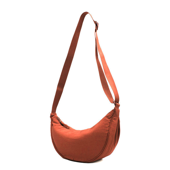 Womens Half Moon Crossbody Bag, offering ample space for daily essentials and travel gear.