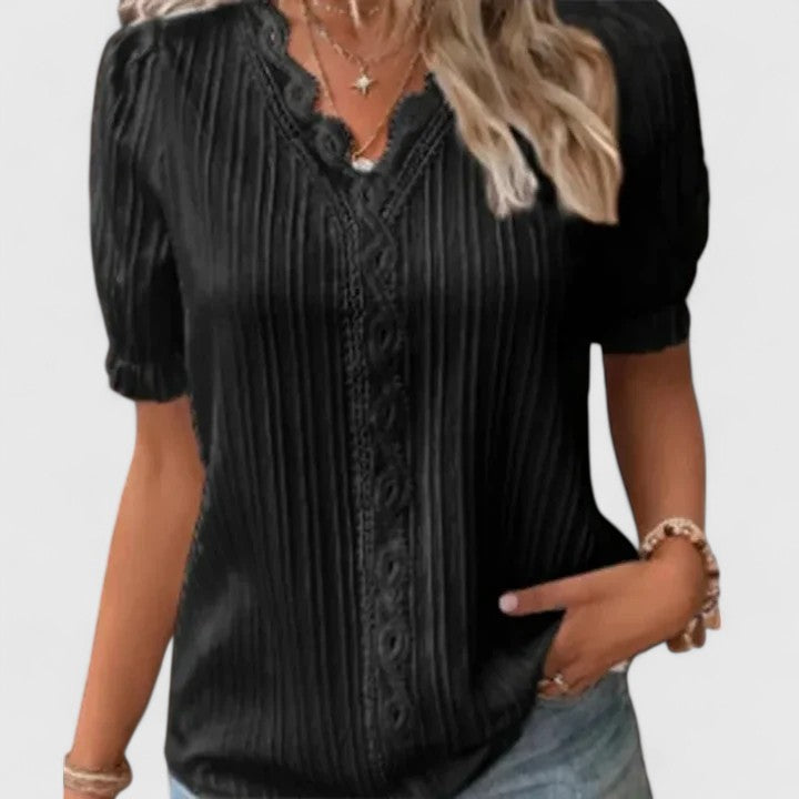 Elegant V-neck women's blouse, chic & breathable summer top. Perfect for casual wear and everyday style.