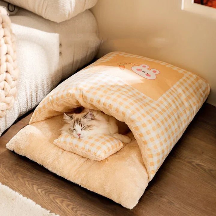Ultra-cozy cat snuggle bed. Plush sleeping bag provides ultimate feline comfort and warmth.