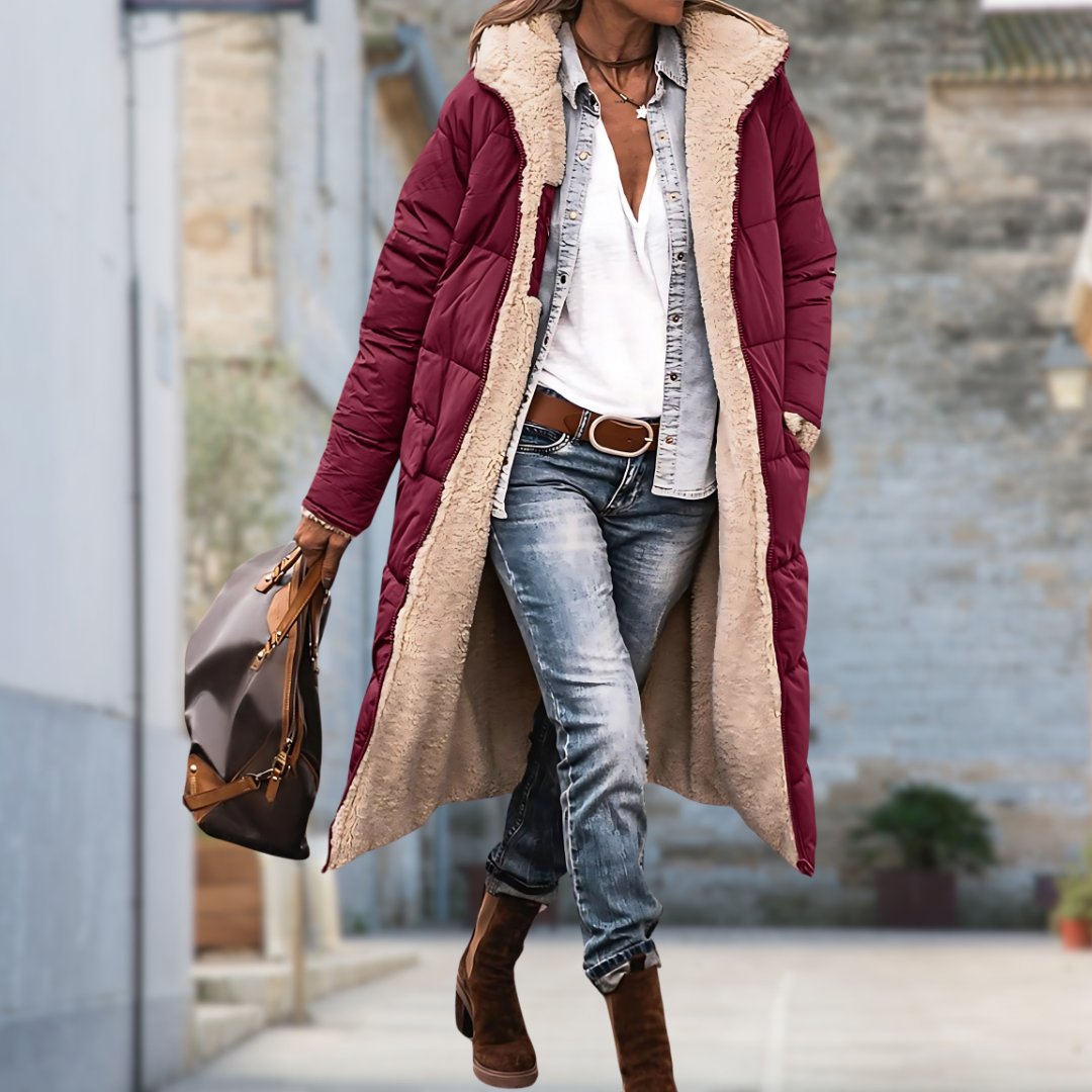 Warm & protective women's windproof waterproof winter coat, essential outerwear for extreme cold.