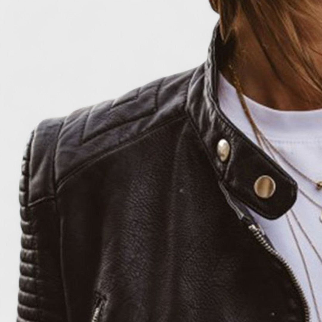 Stylish women's asymmetrical zipper jacket. Fitted black outerwear with long sleeves & stand collar. Practical fashion.