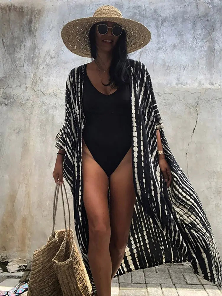 Chic beach sarong for vacation wear, a versatile swimsuit cover-up.