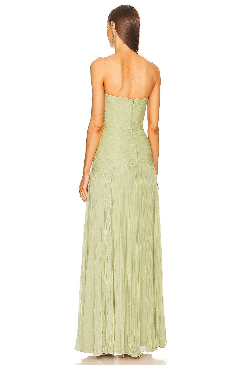 Lightweight pistachio green sleeveless maxi dress for women, elegant and comfortable for summer days and evening wear.
