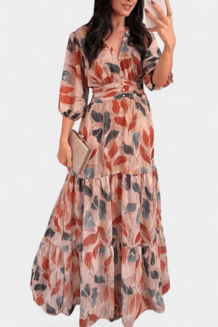 Women's elegant long sleeve printed maxi dress, V-neck, flowing design. Perfect for comfortable style.
