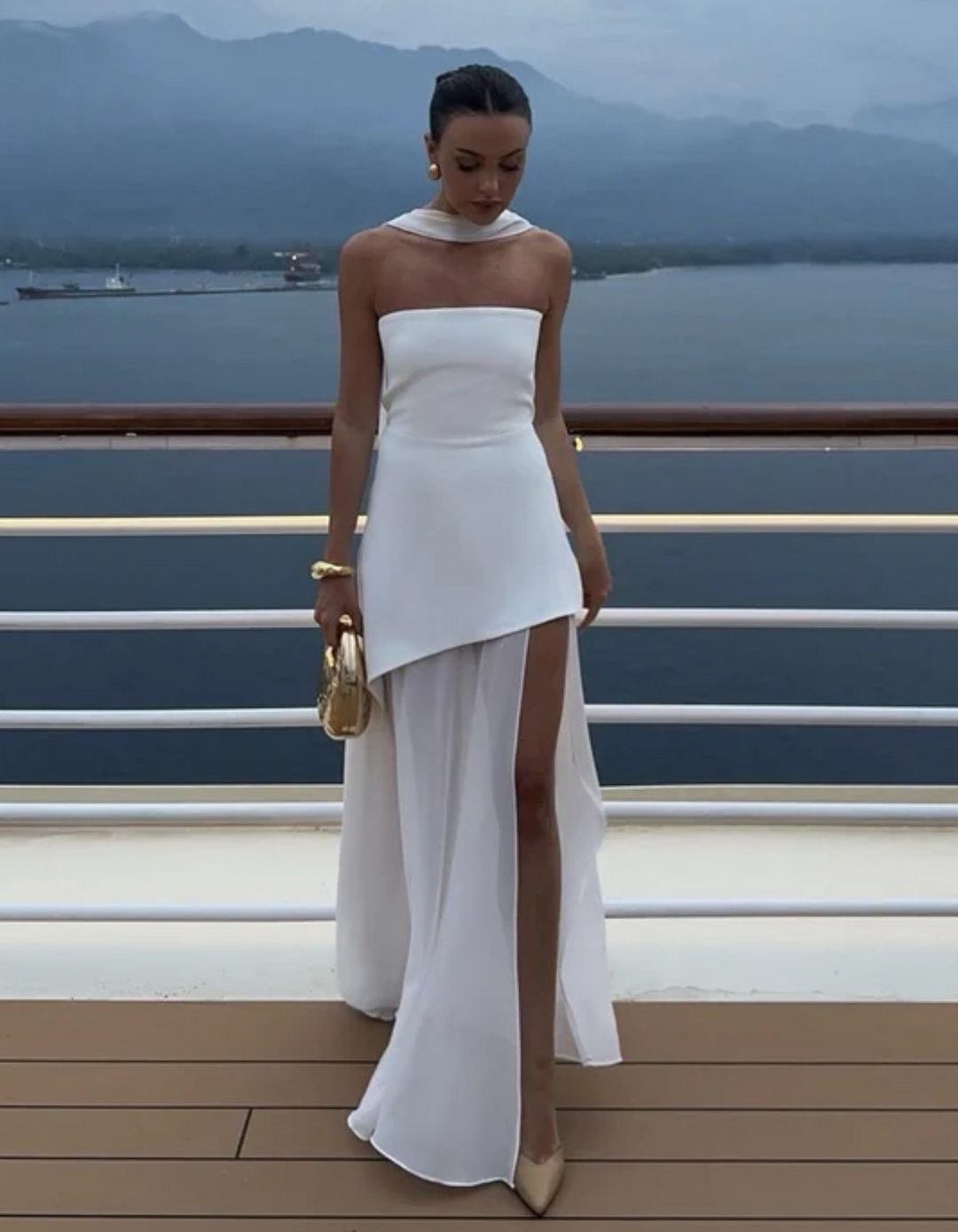 Luxurious fabric detail of a women's strapless maxi dress, designed for effortless evening elegance & comfort.