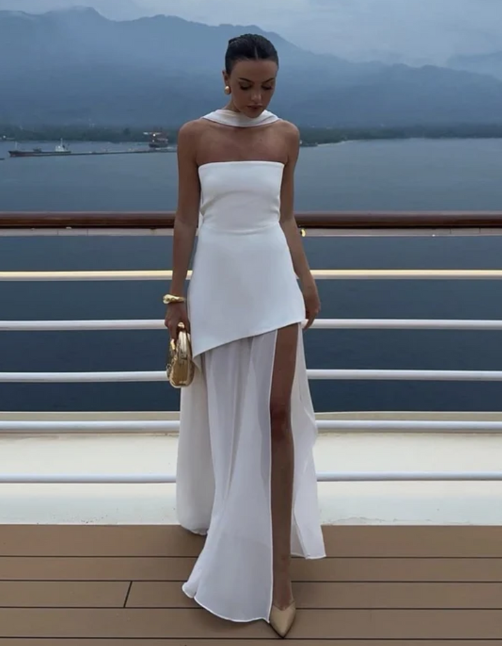 Luxurious fabric detail of a women's strapless maxi dress, designed for effortless evening elegance & comfort.
