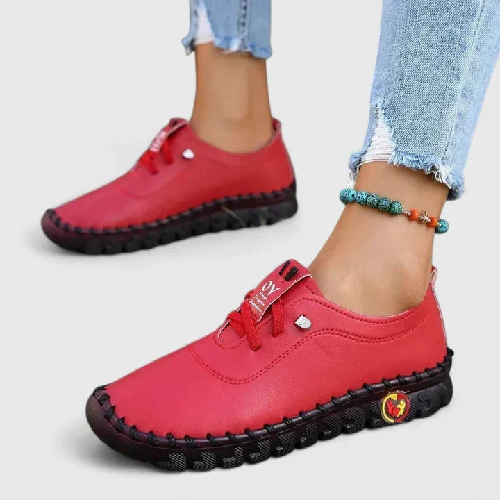 Women's walking shoes with strong arch support, adjustable fit, and shock-absorbing orthopedic design.