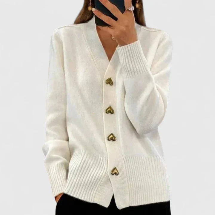 Women's elegant cardigan, long sleeve, cozy knit. Features charming heart buttons, great for everyday autumn fashion.